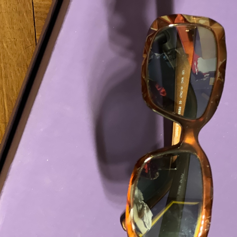 Very nice Fendi sunglasses with everything. It has some prescription in it.